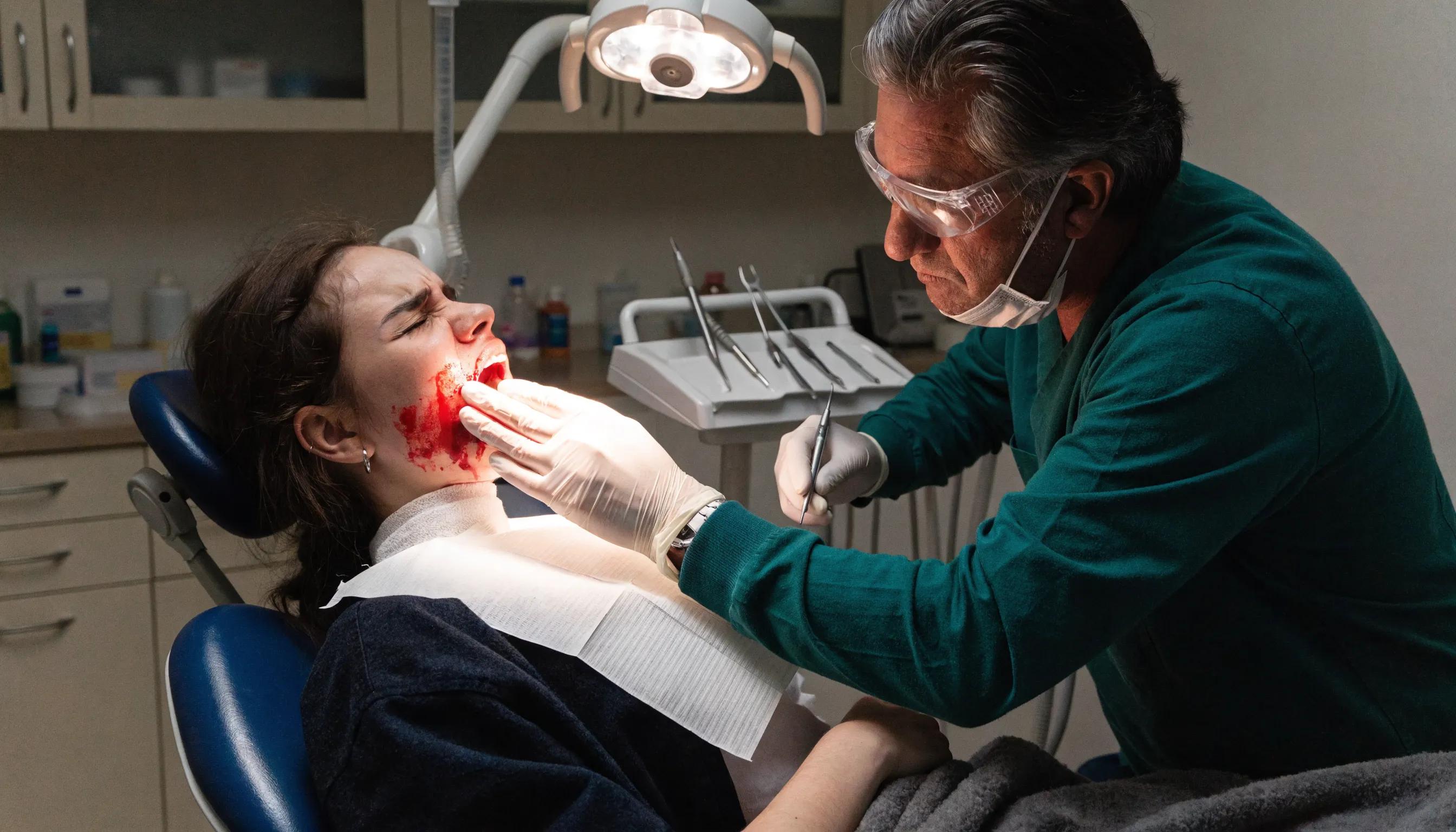 Dentist providing emergency dental care to a patient, highlighting the urgent response and professional environment